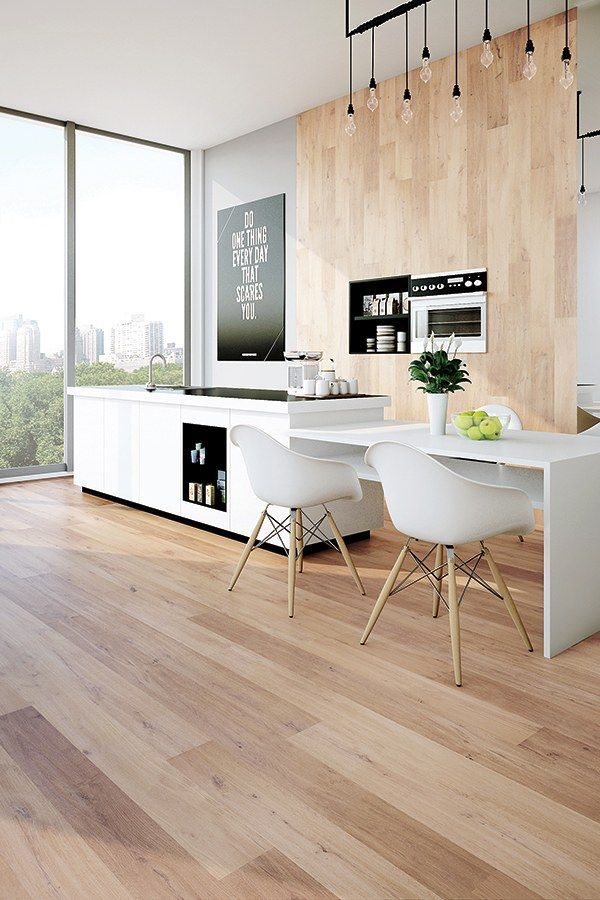 Modern Kitchen With White Cabinetry and Light Wood Floors — Canberra Floor Coverings in Queanbeyan West, NSW