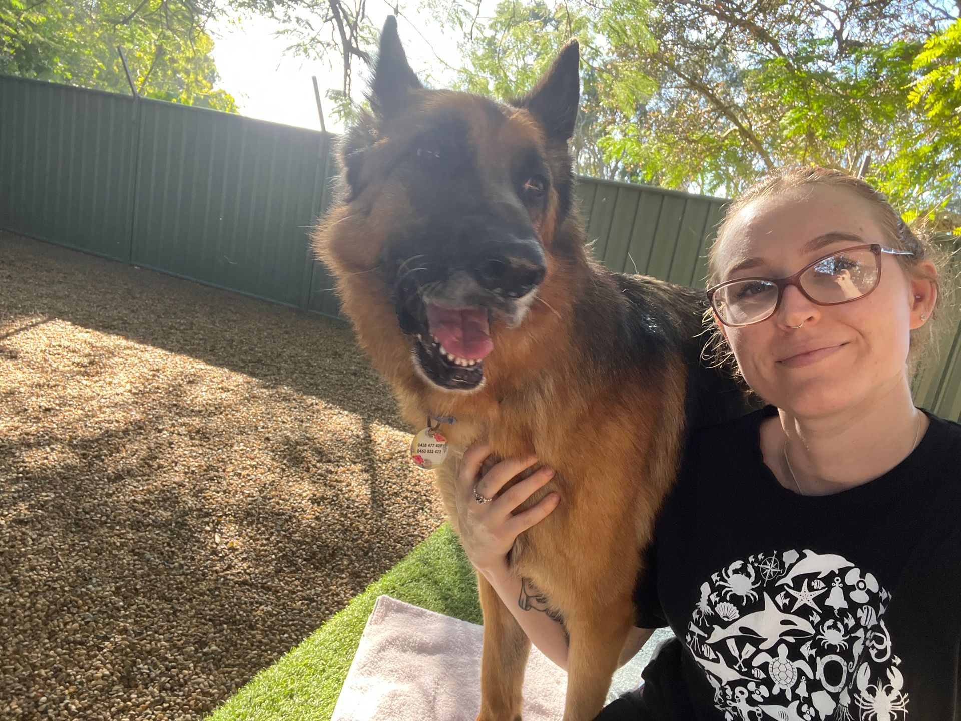 Woman With Glasses Posing — Yeppoon Boarding Kennels & Cattery In Farnborough, QLD