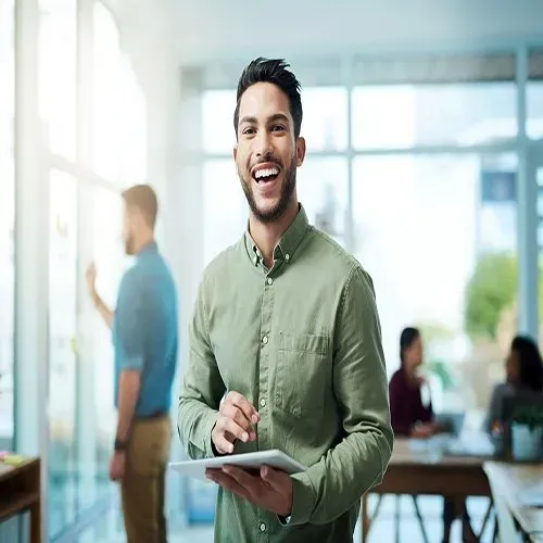 young businessman using a digital tablet in an office