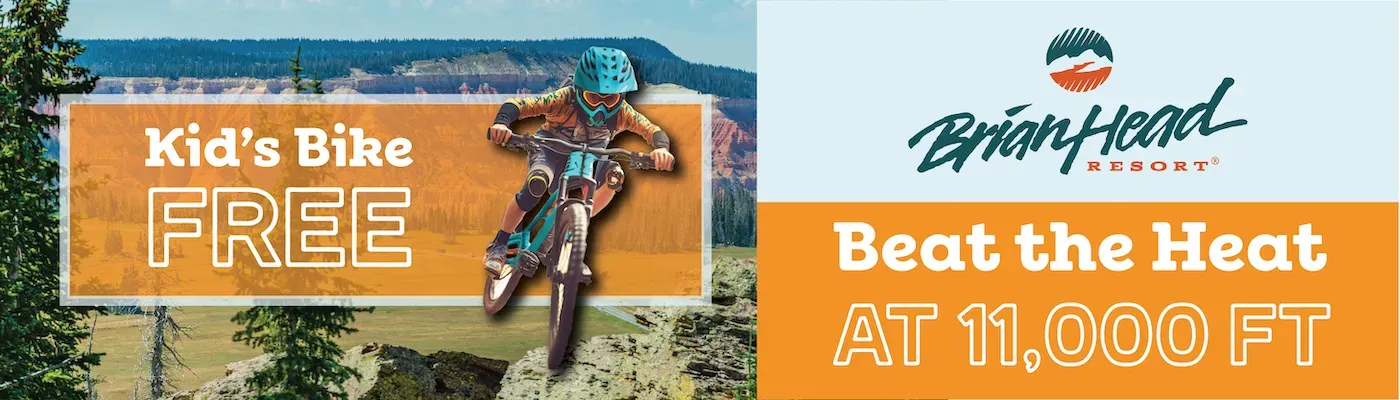 Banner reading “Kid’s Bike FREE” with a cyclist, and “Beat the Heat at 11,000 ft” for Breckinridge.