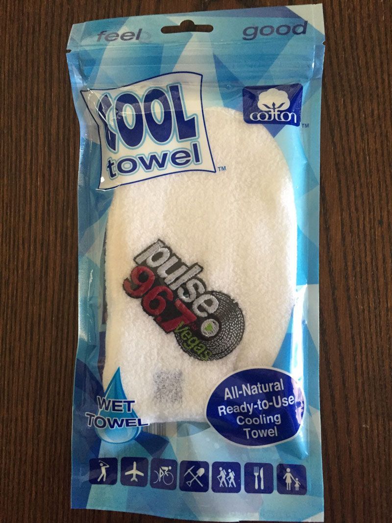 Blue-packaged “cool towel” product labeled “Pulse 3600,” white towel visible inside.