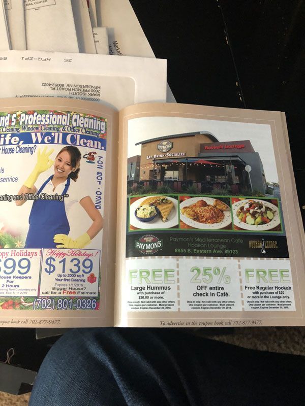 Open magazine spread with a woman ad on the left and restaurant food specials on the right.