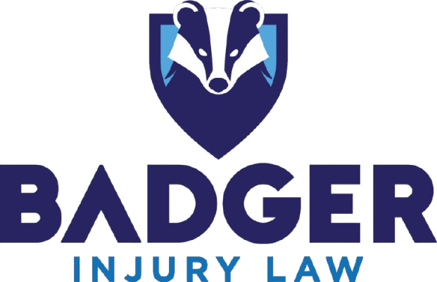 Badger Injury Law logo with blue badger shield icon and text