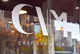 Chef Von & Mom logo on the window of the restaurant 