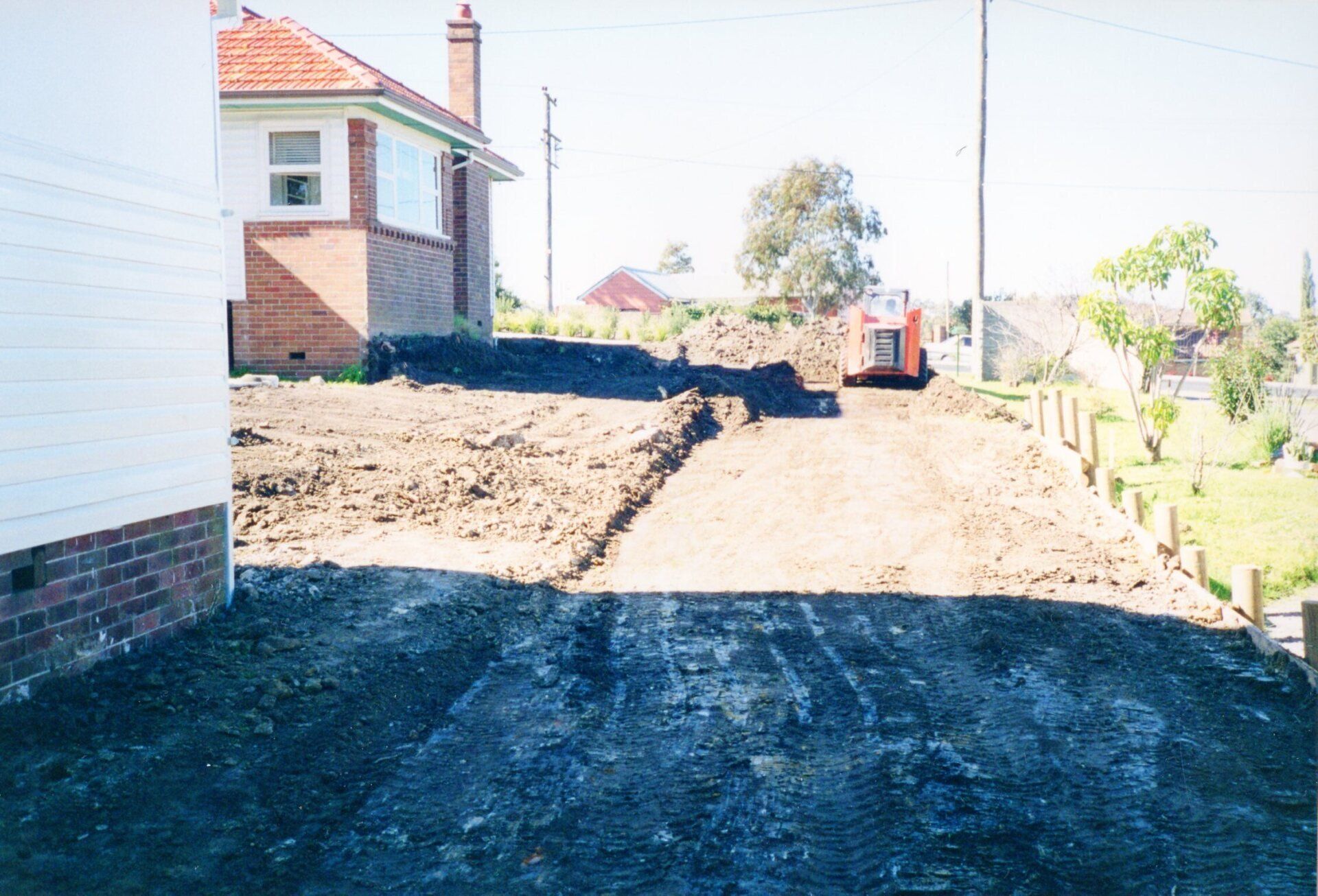 Backyard Under Construction With Excavator — Newcastle Wildflower Nursery in About Us, NSW