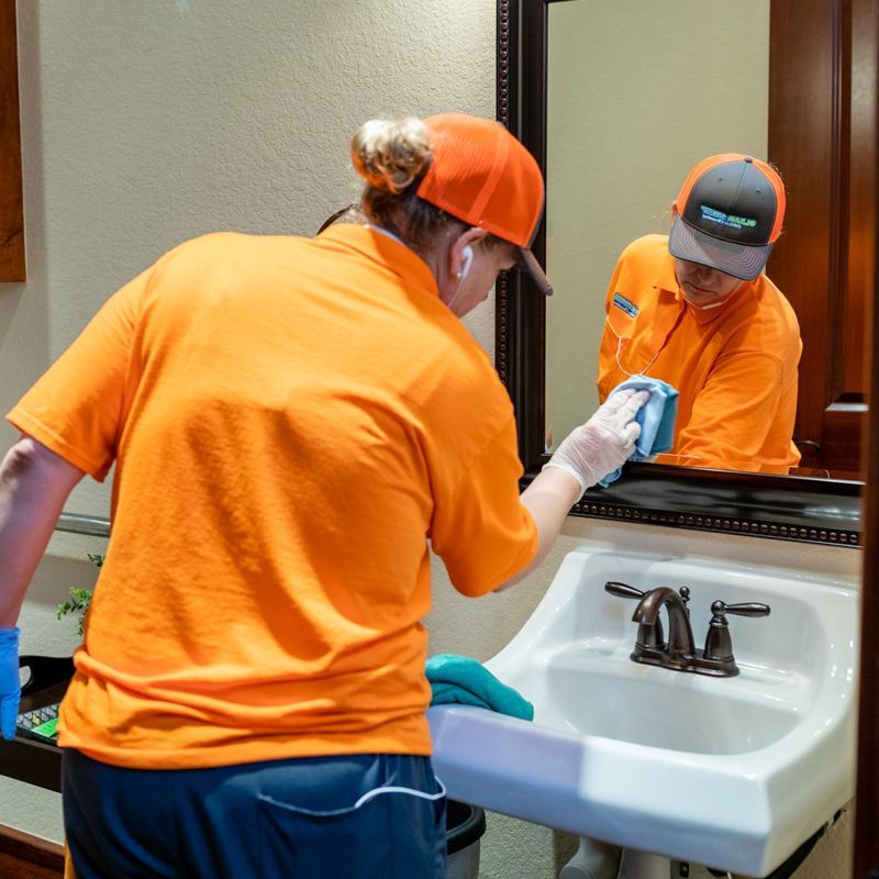 Wiping The Bathroom Mirror Wiping The Bathroom Mirror