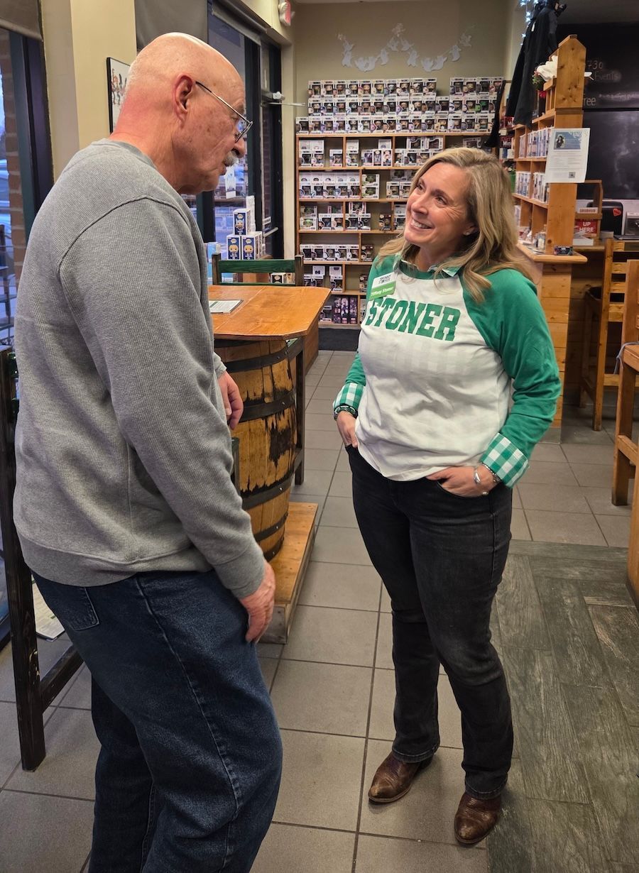 Tiffany Stoner speaks with a voter