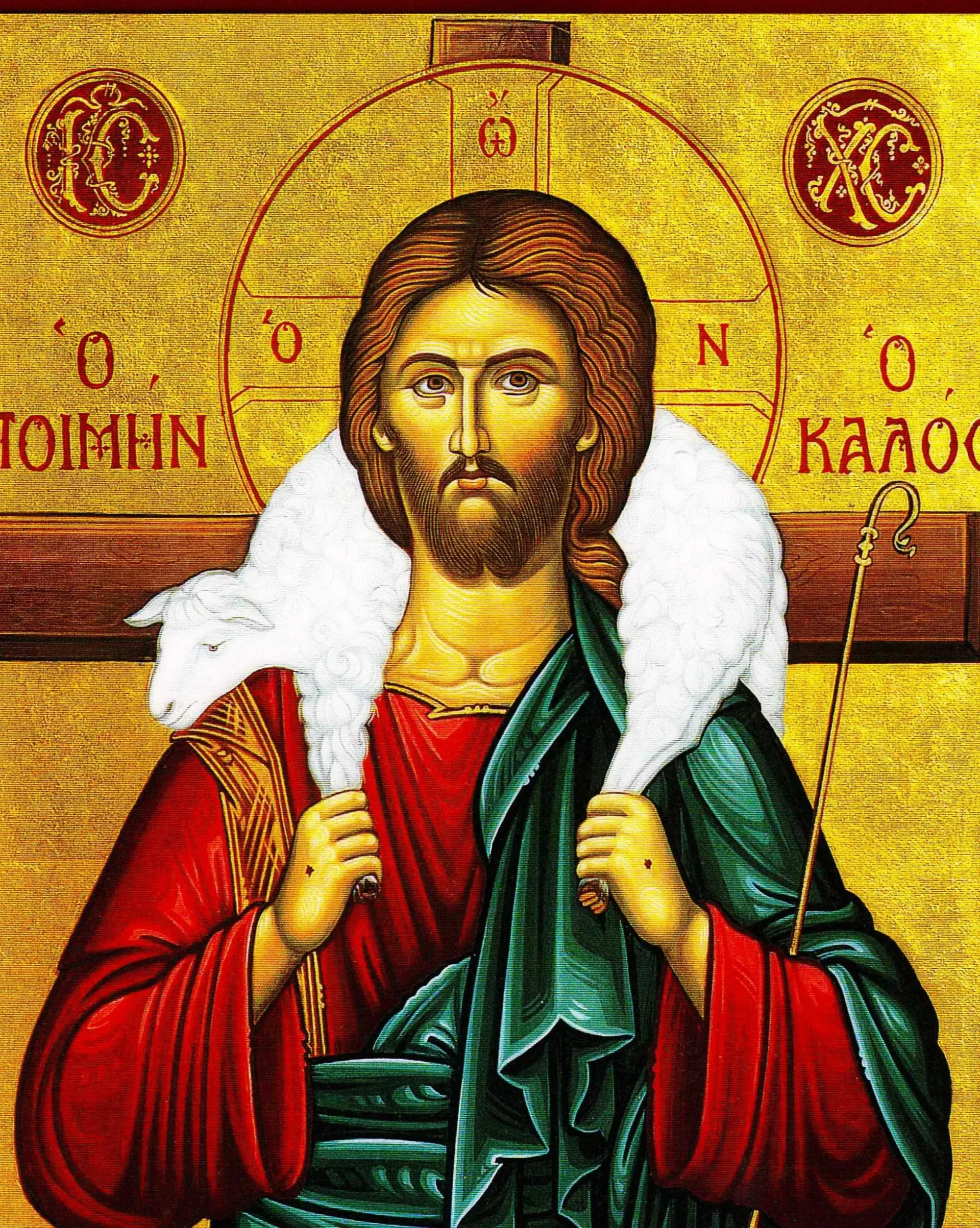 Byzantine-style icon of Jesus Christ with halo, red and green robes, on a gold background