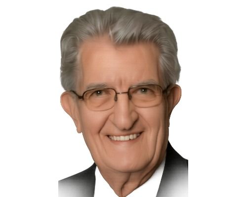 Smiling man with gray hair and glasses on a white background