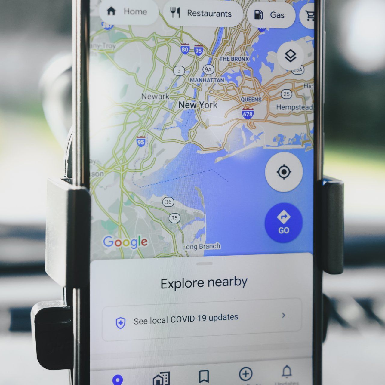 A cell phone is displaying a map of new york