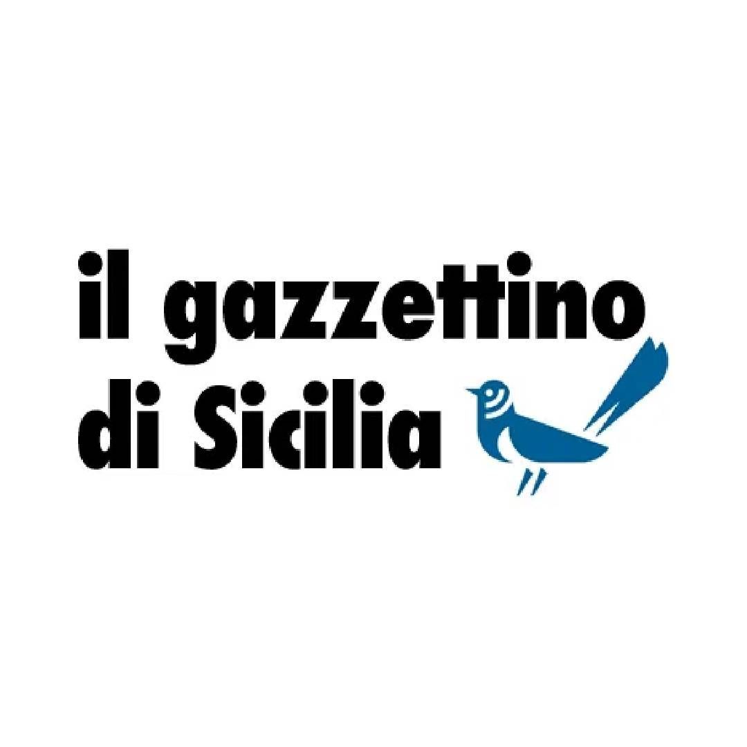 A logo for il gazzettino di sicilia with a blue bird