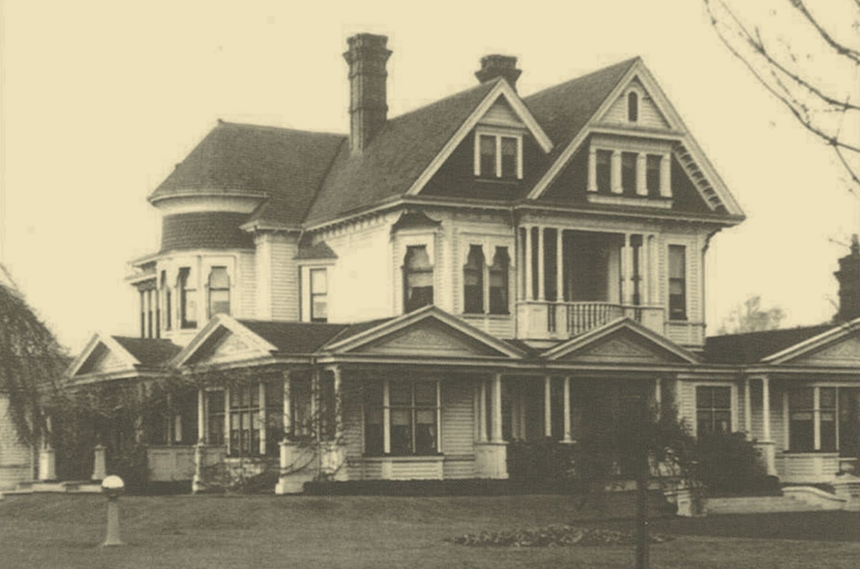 A black and white photo of a large house - Nurse Maude