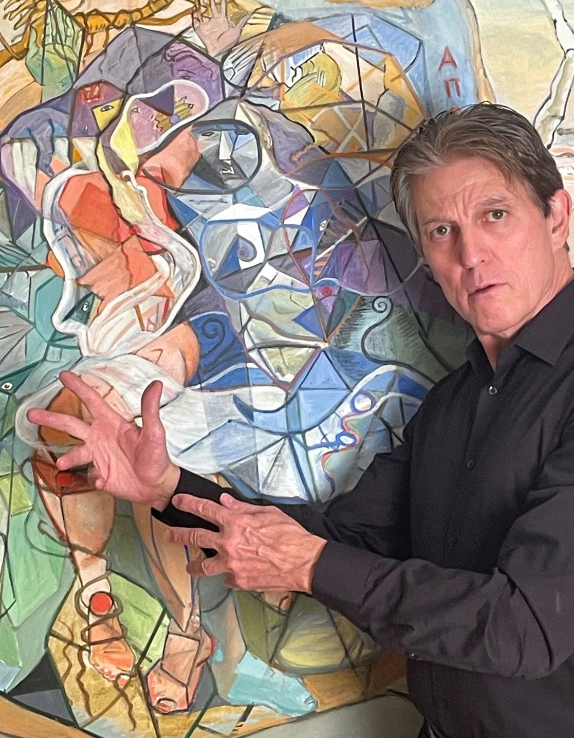 John Varriano expressively standing in front of 