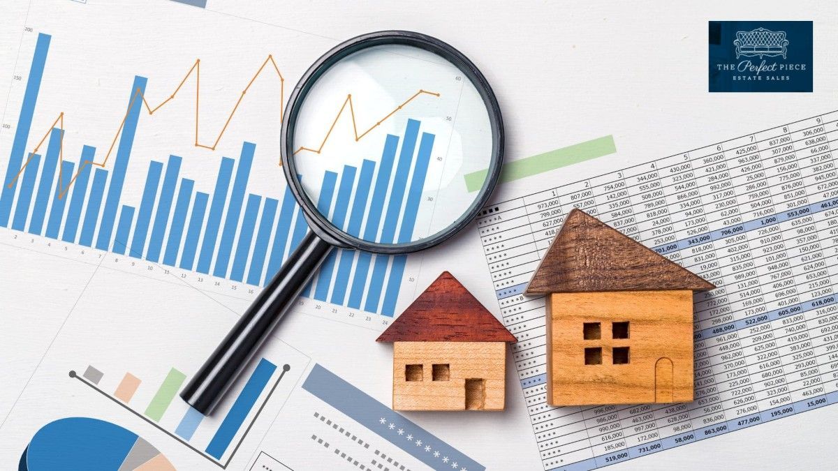 A magnifying glass is sitting on top of a graph next to a model house.