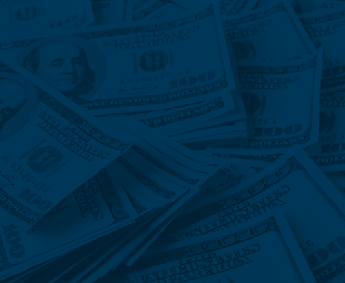 A pile of money is stacked on top of each other on a blue background.