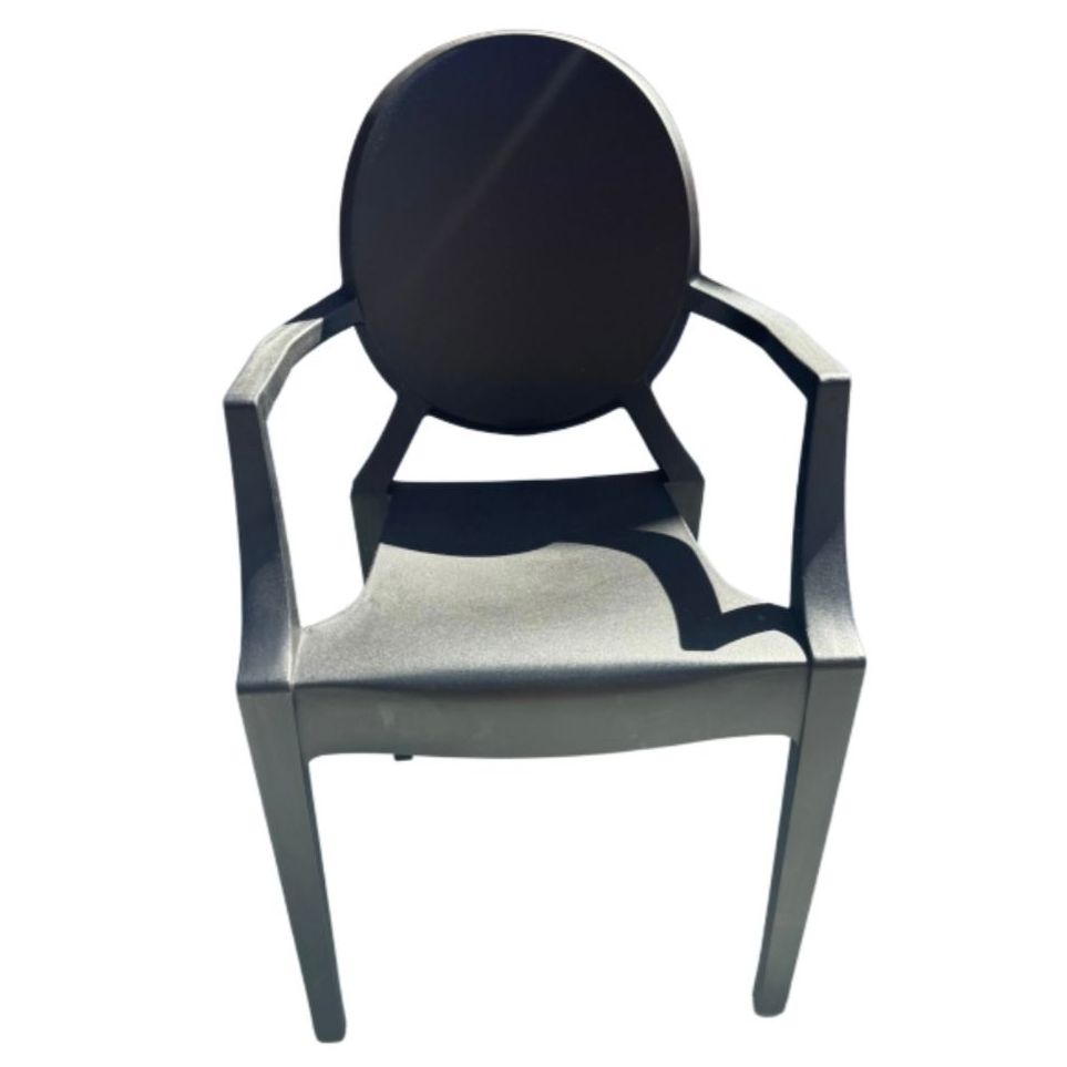 Black round-backed chair with gray arms and legs on a light background