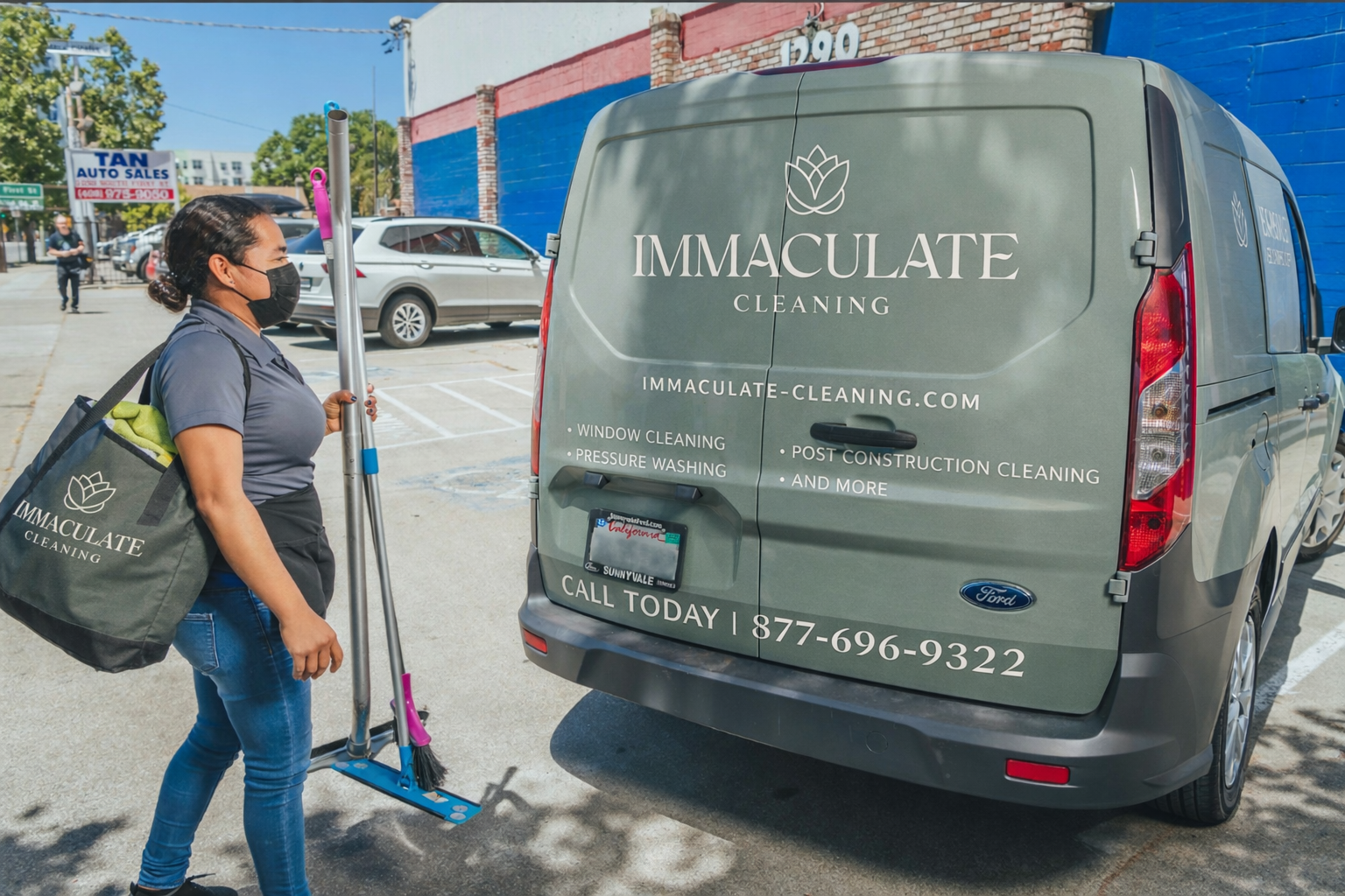 Woman with scooter beside a gray Immaculate Cleaning van on a sunny street