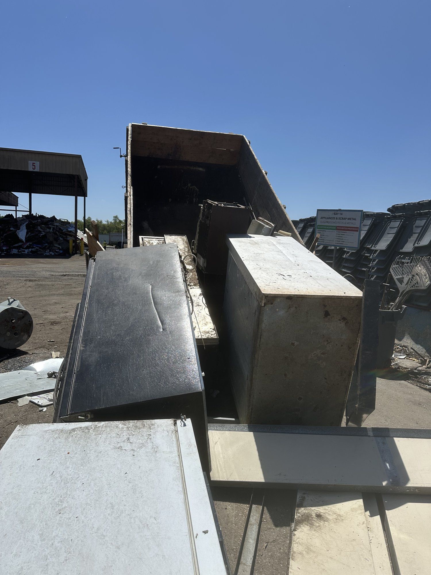 Old dresser and furniture loaded on the LJ Junk Away trailer for haul away