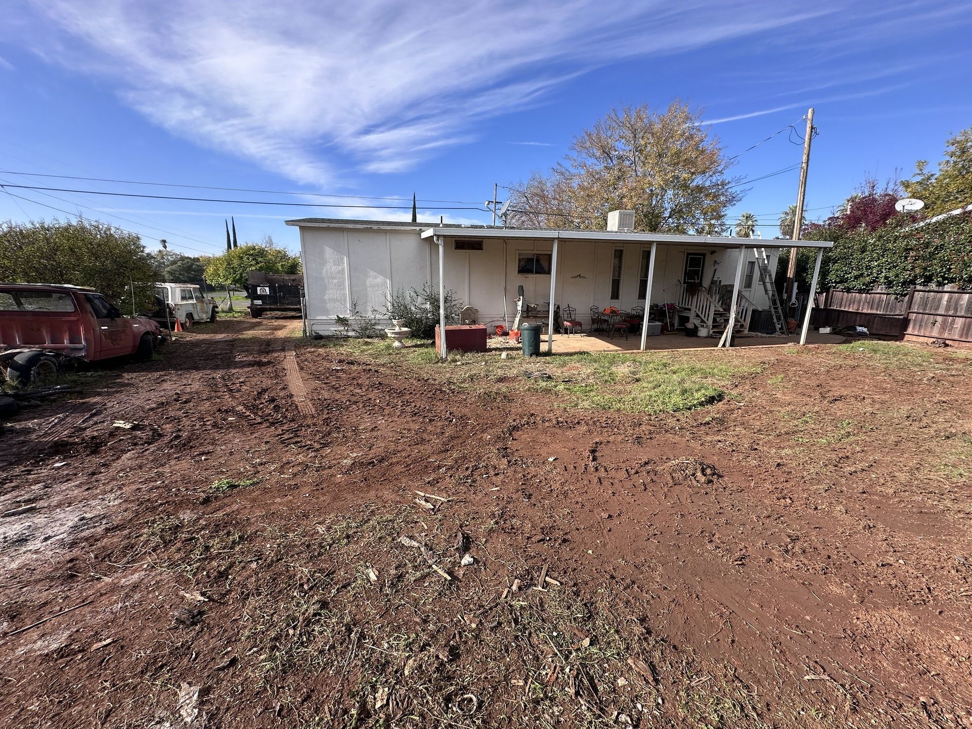 Cleared backyard after scrap and junk removal