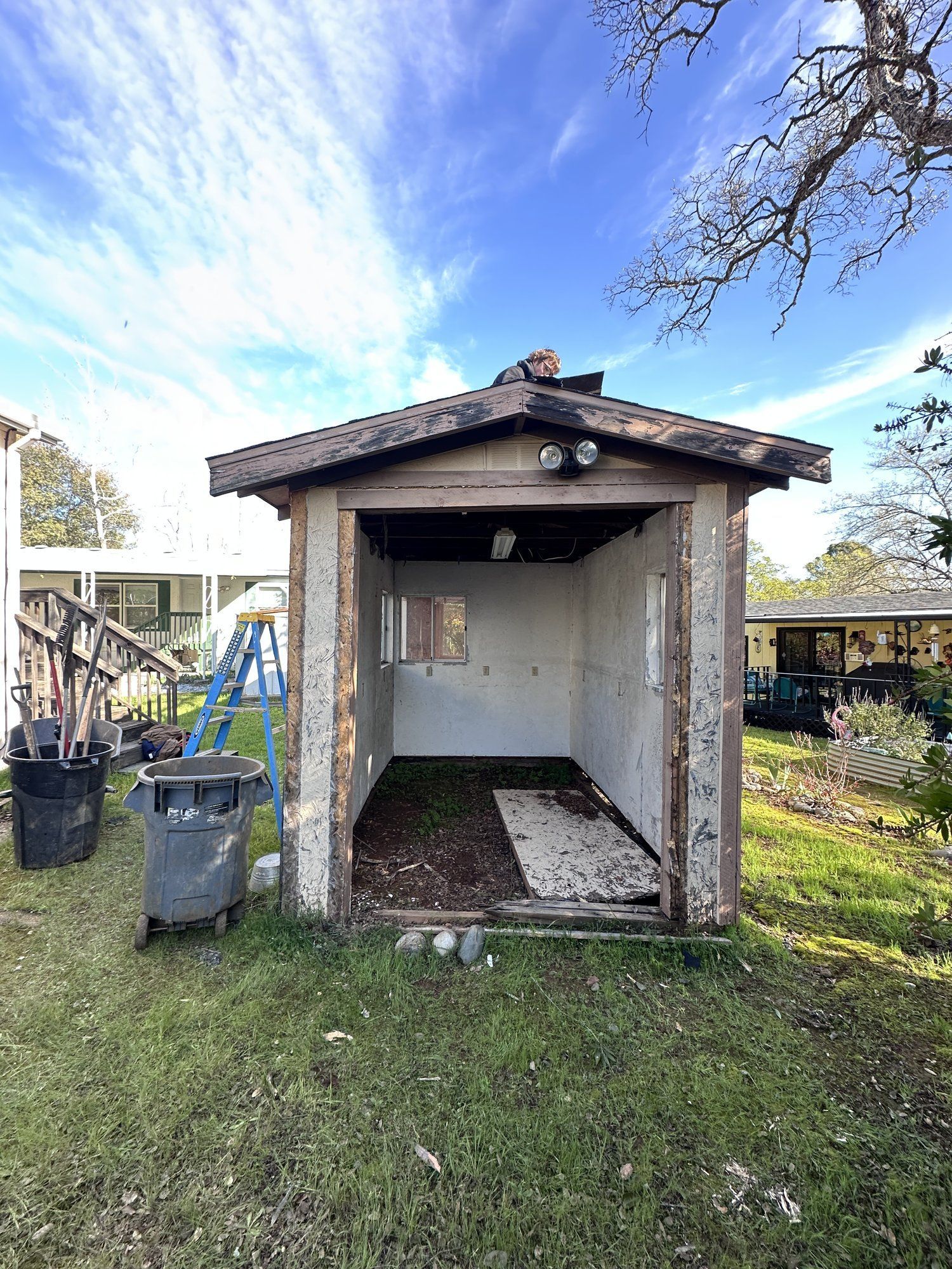 Small backyard shed before demolition