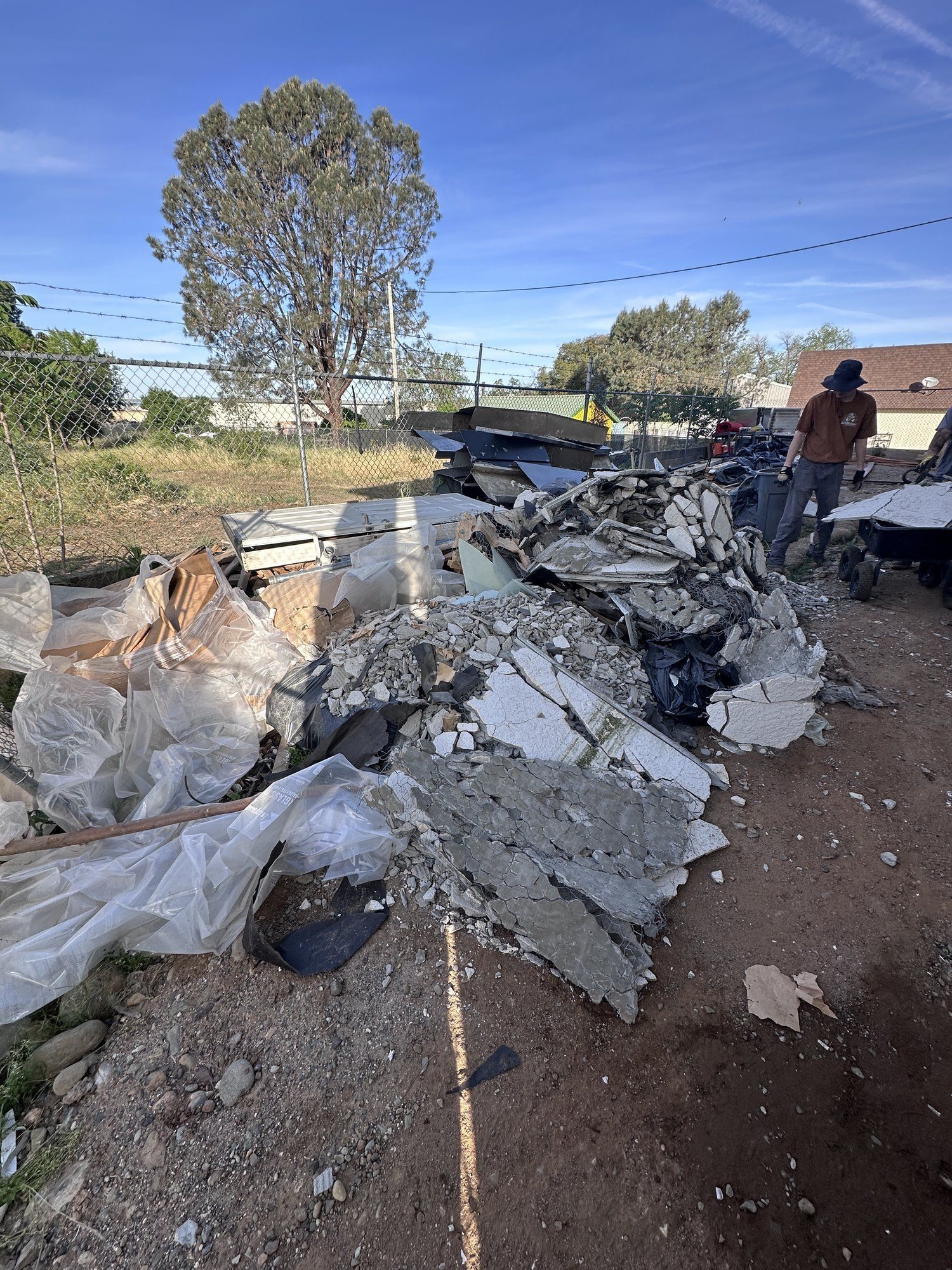 Pile of demolition debris and drywall before haul away