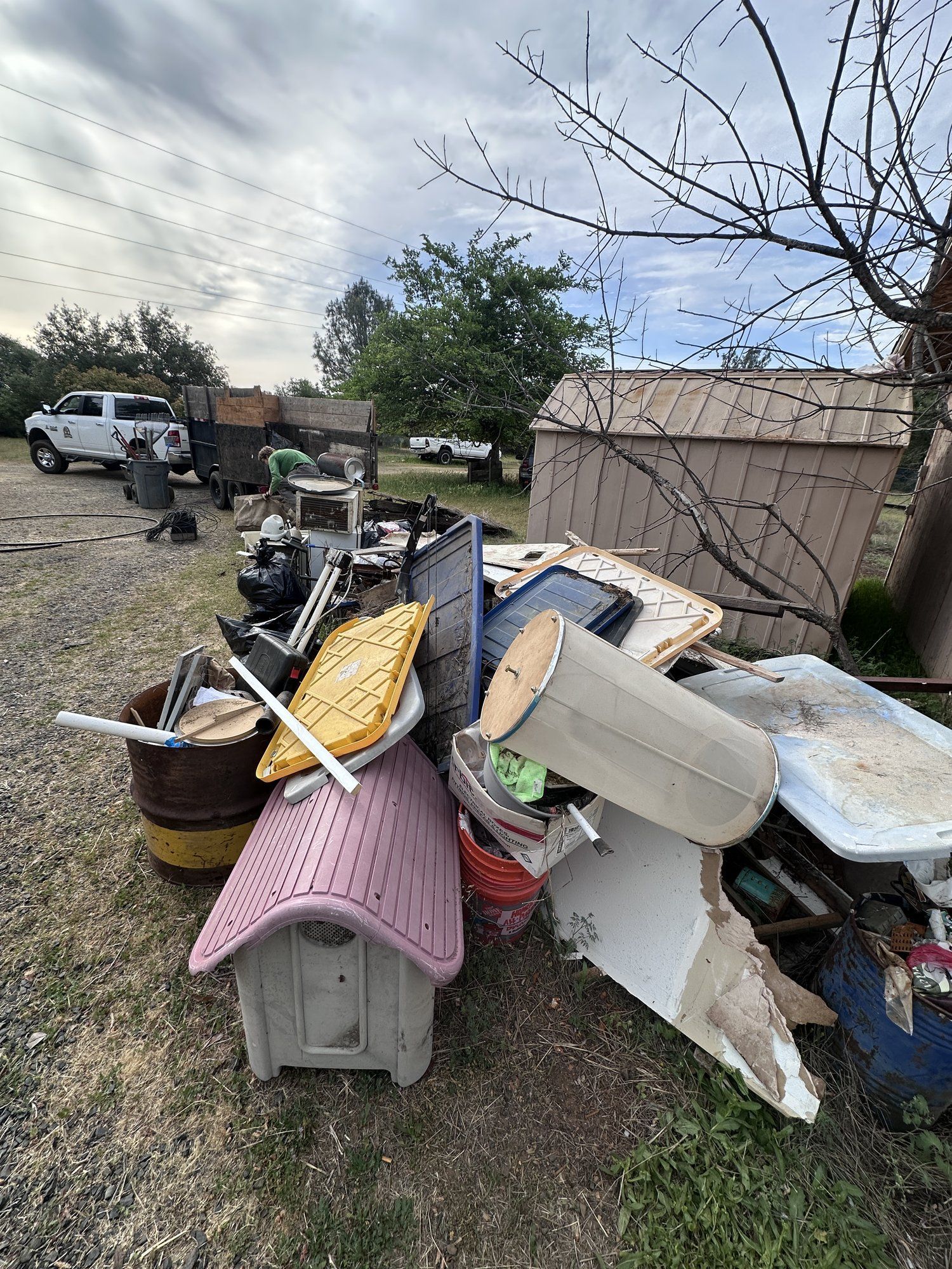 Curbside pile of furniture and junk before pickup
