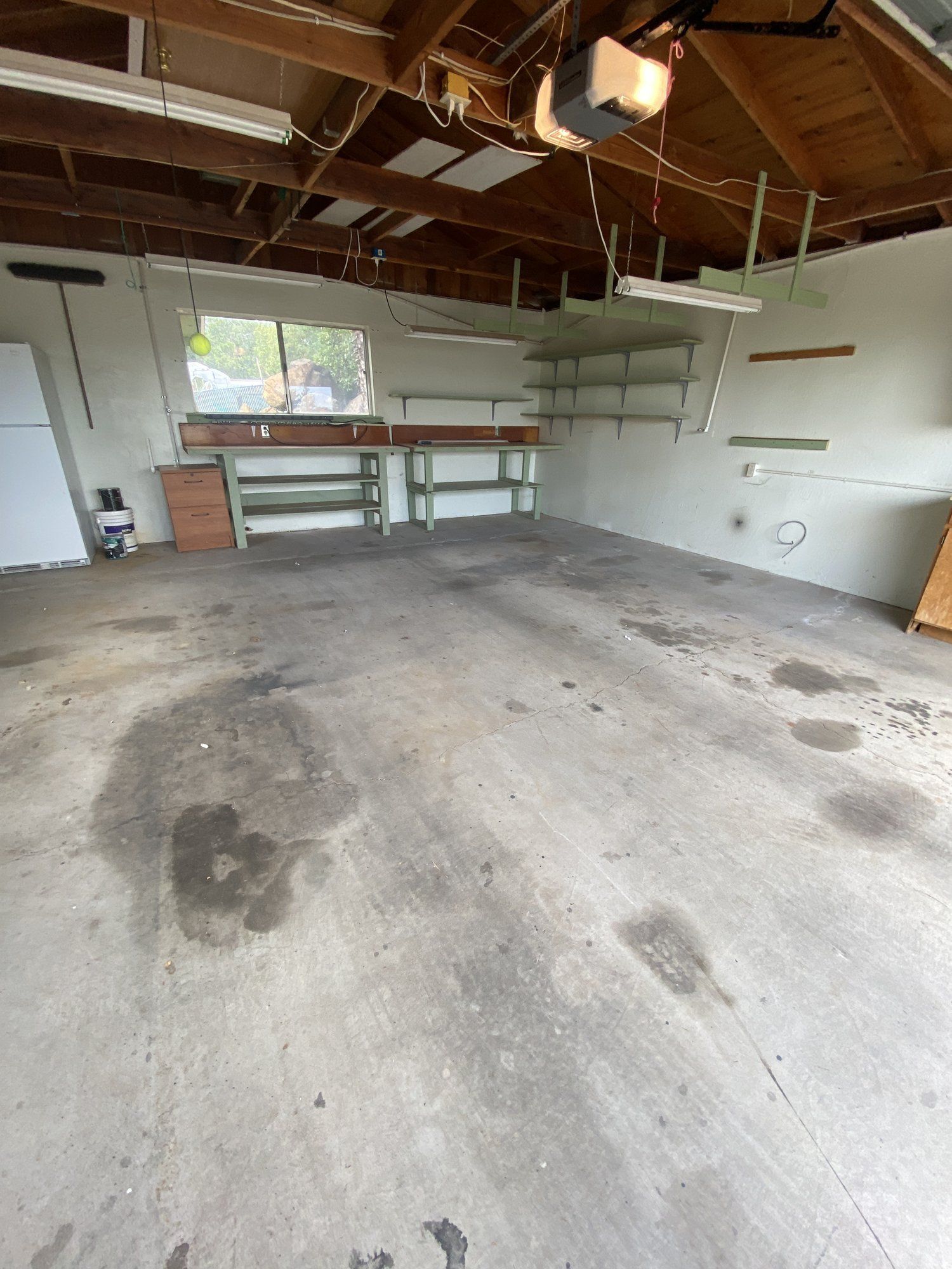 Empty garage after LJ Junk Away cleanout