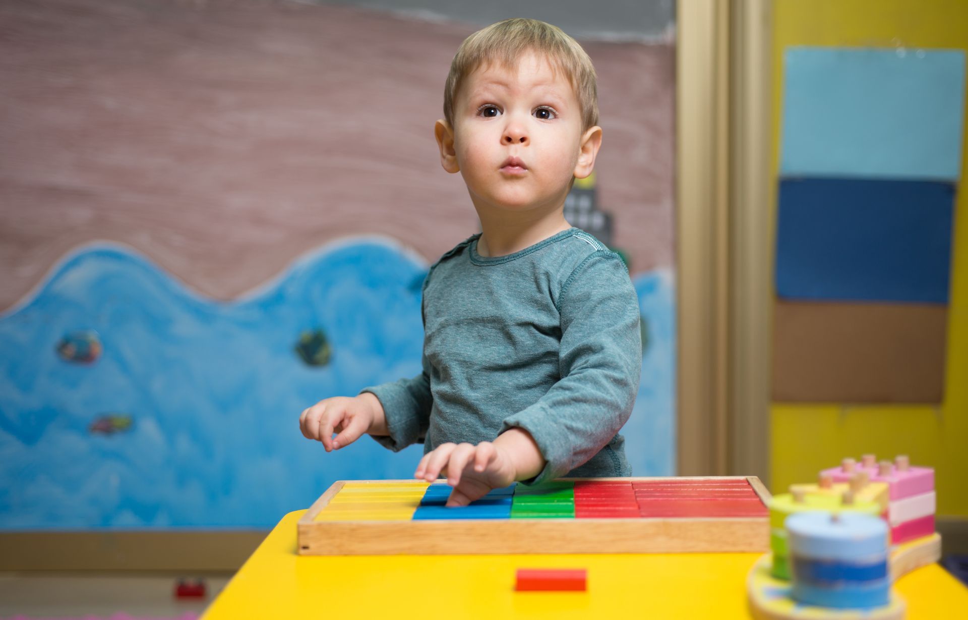 Children in a pre-kindergarten classroom engaged in hands-on learning activities Children in a pre-kindergarten classroom engaged in hands-on learning activities