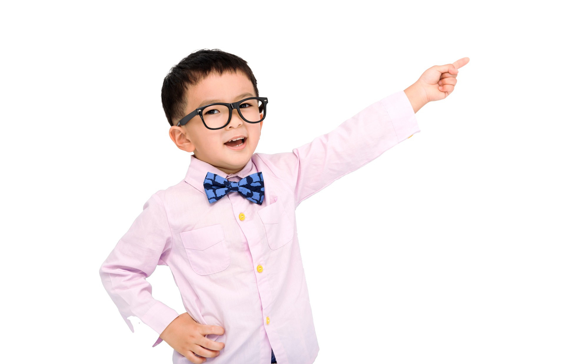 Boy with glasses and bow tie points upward, wearing a pink shirt. Young boy with glasses and bow tie pointing upwards.