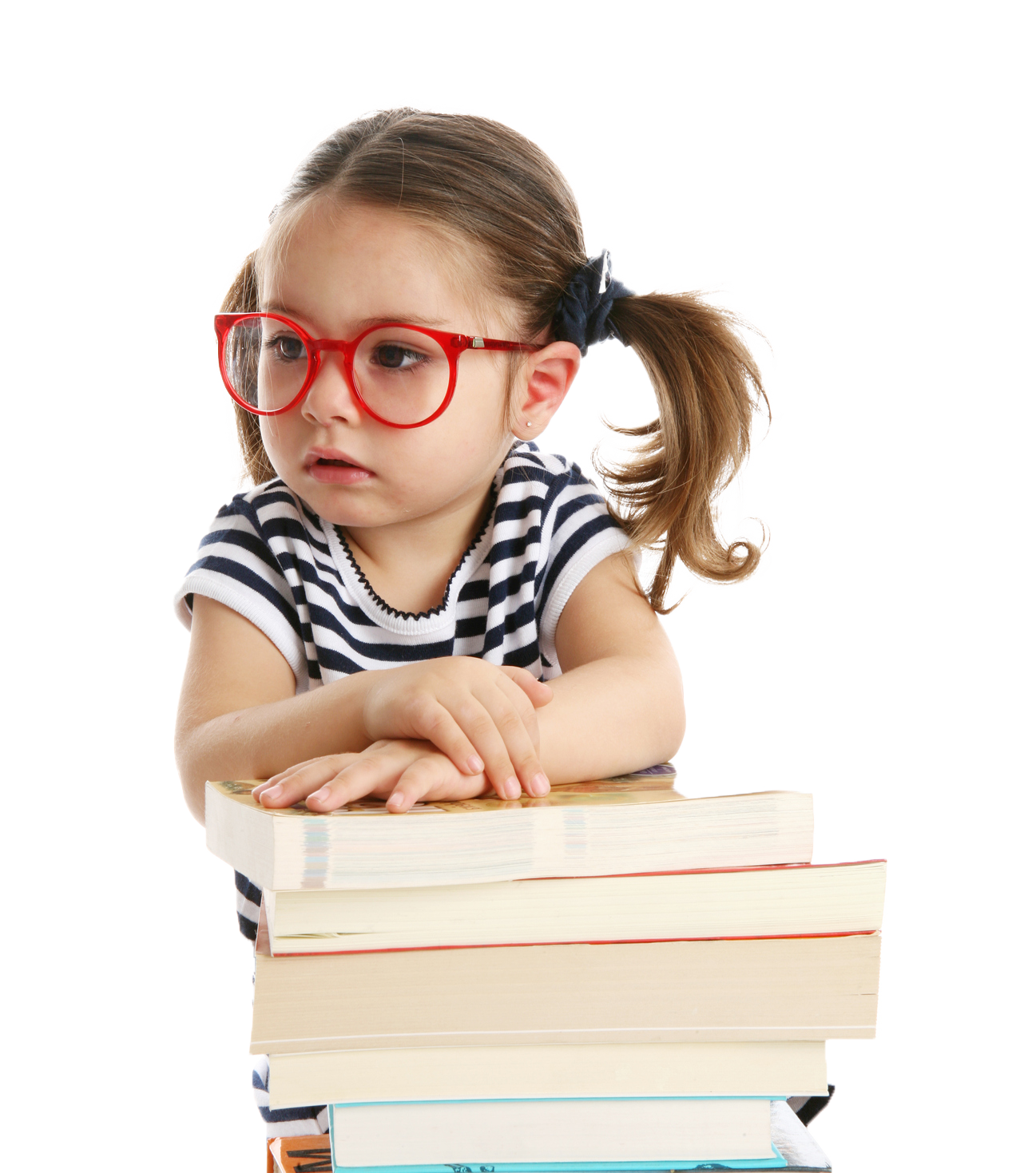 Young girl with glasses and pigtails looks thoughtful, resting arms on a stack of books.