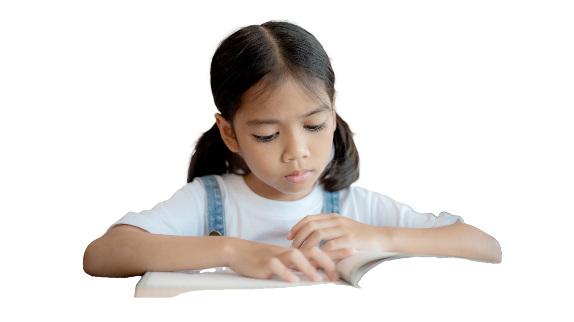 Girl with dark hair in pigtails, reading a book, focused expression, white background.