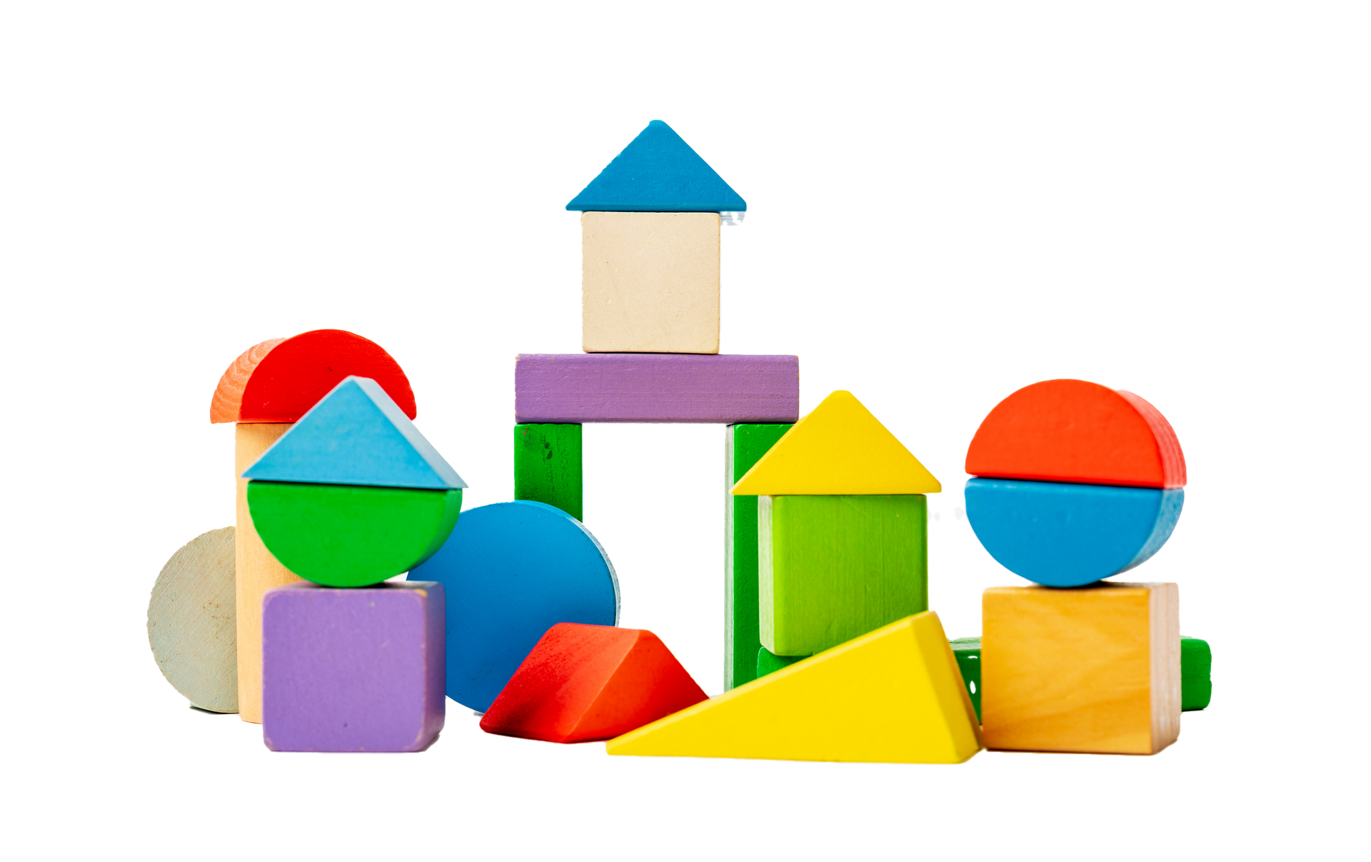 Colorful wooden building blocks arranged in a whimsical structure, various shapes and colors.