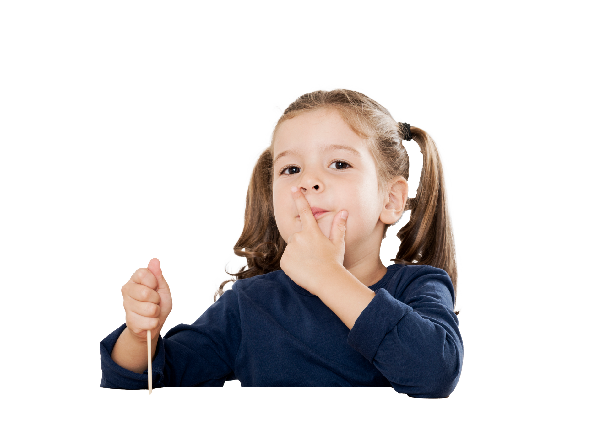 Girl in blue shirt with pigtails is picking her nose, holding a stick, with a white background. Girl with pigtails holds a stick, fingers at nose; blue shirt, white background.