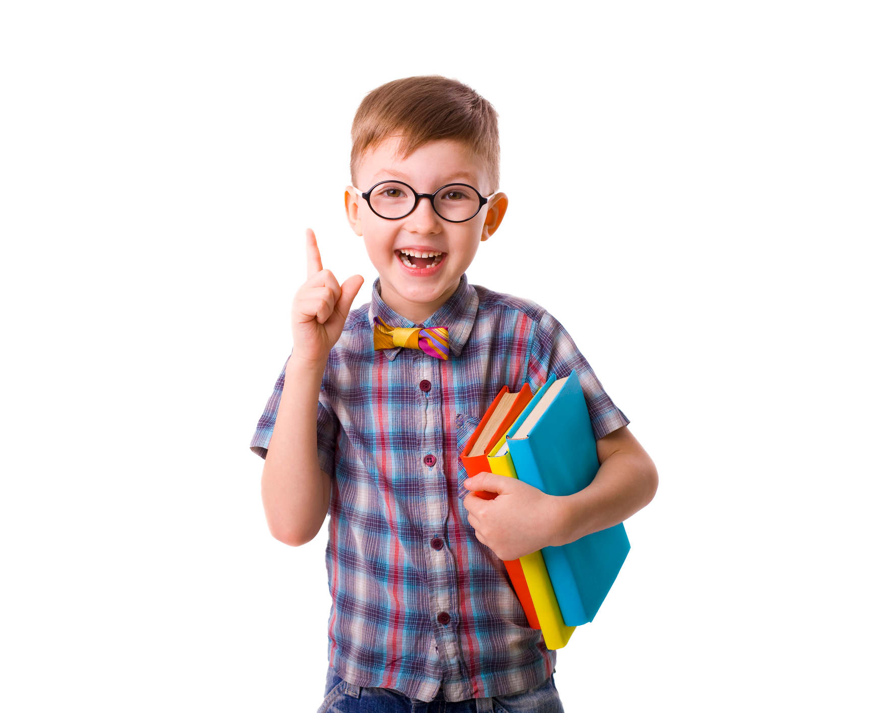 Boy with glasses holds books, points up with a bright smile.