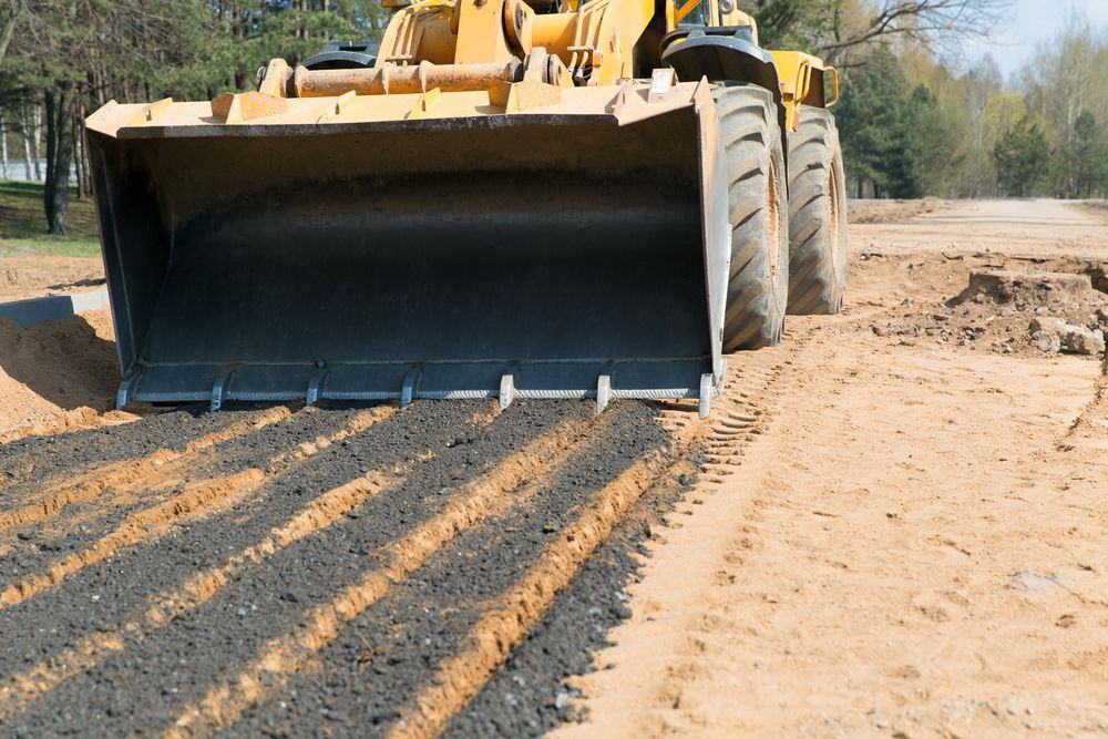 A Bulldozer Is Moving Dirt On A Construction Site — Territory Industries Pty Ltd In Uralla, NT