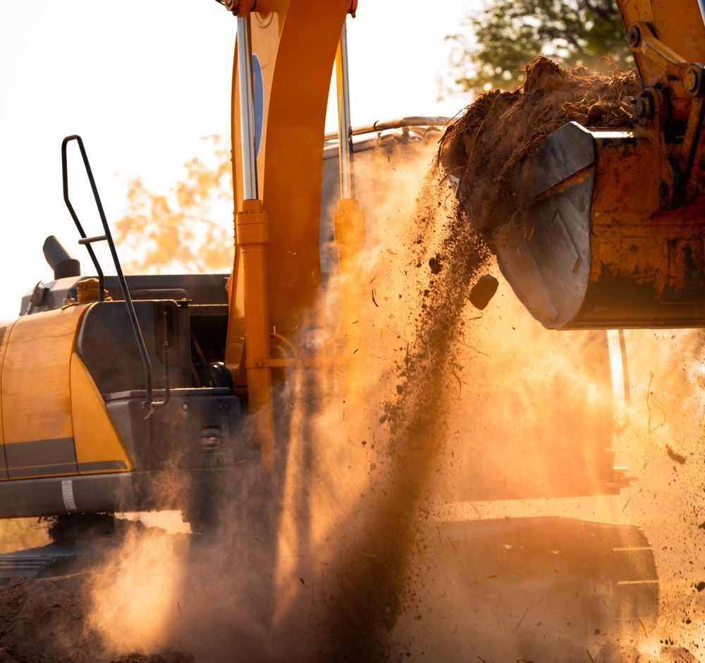 A Yellow Excavator Gathered Many Amounts Of Dirt — Territory Industries Pty Ltd In Larrimah, NT