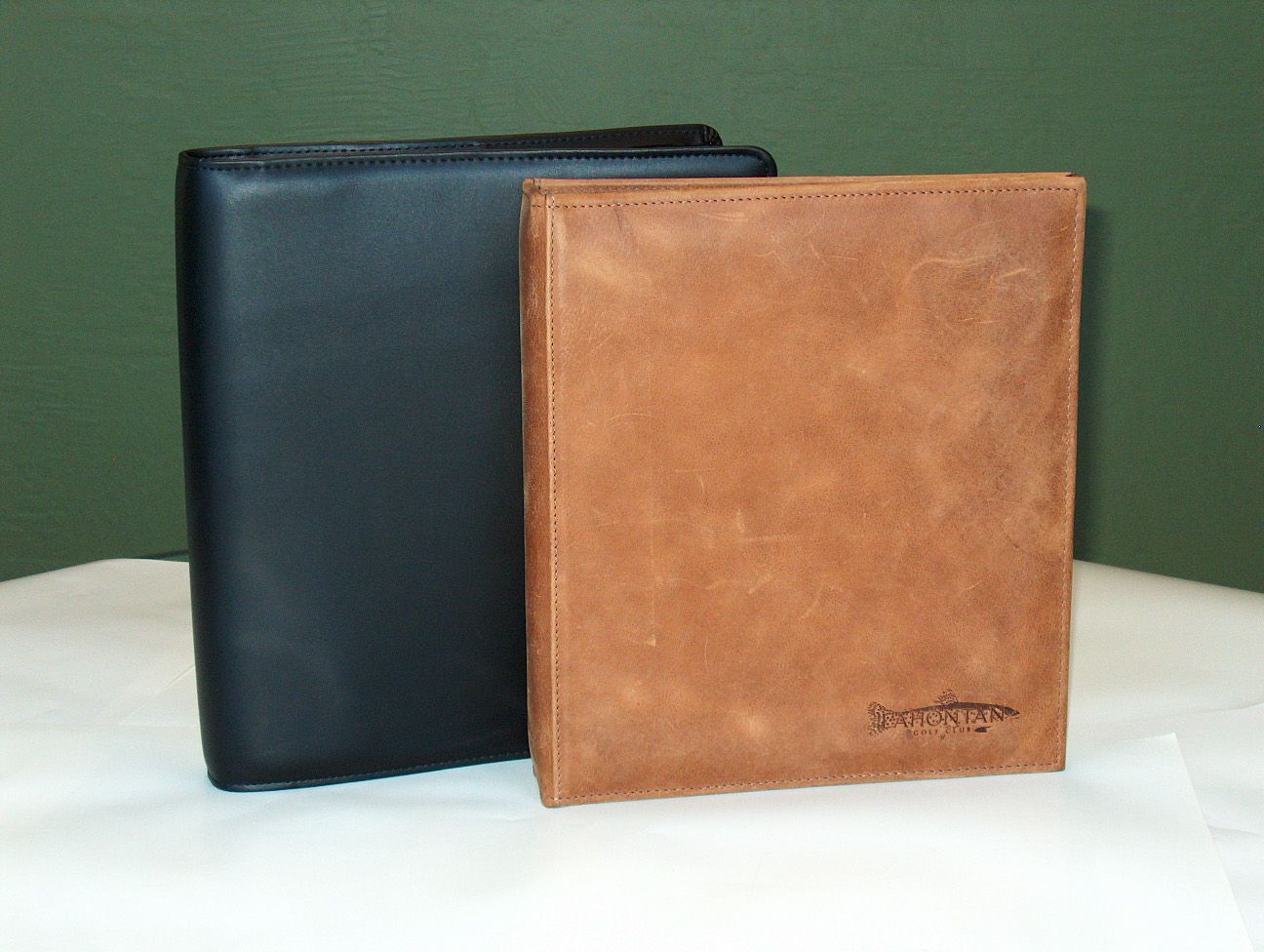 Luxury leather turned edge binder with sewn edges and foil stamped logo