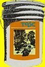 Yellow-and-orange can with black label and gray top, showing a dark animal illustration.
