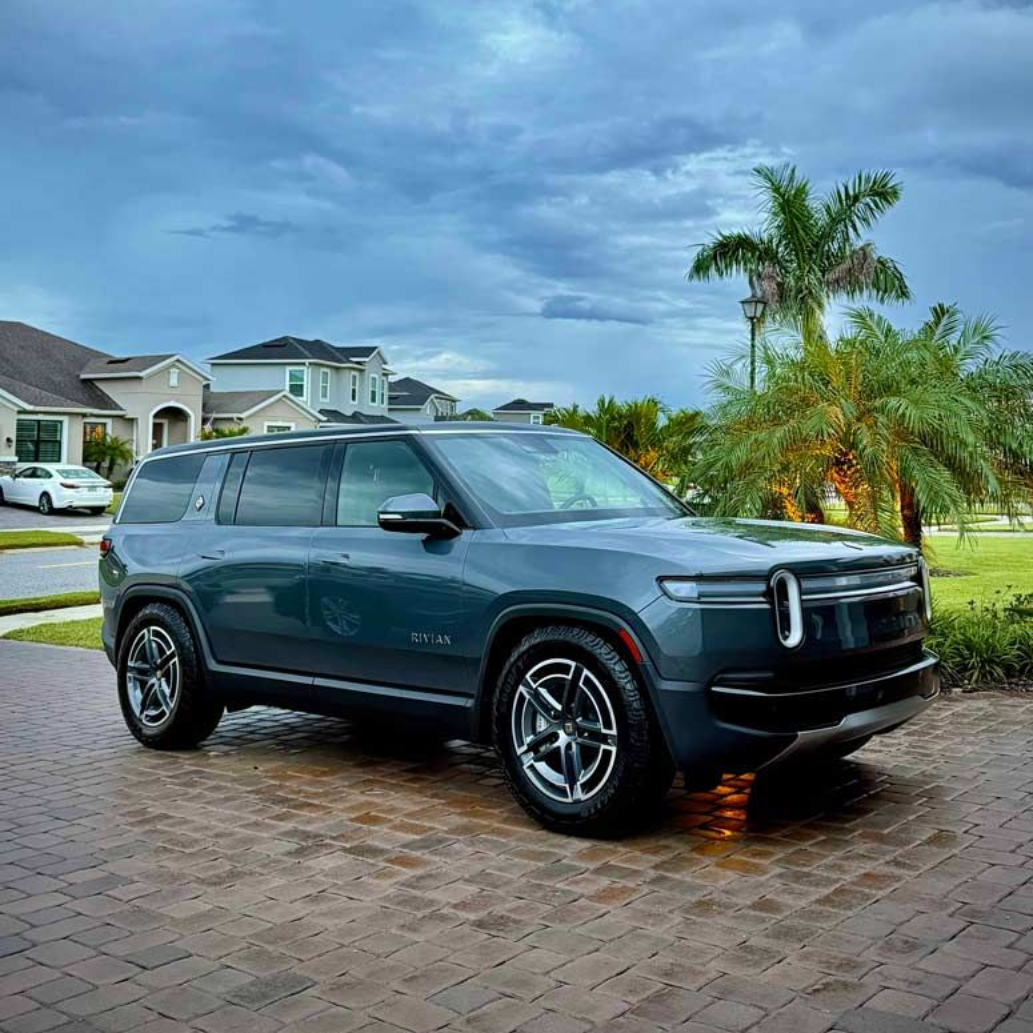 a light blue Rivian R1S after receiving a full detail in Viera, FL