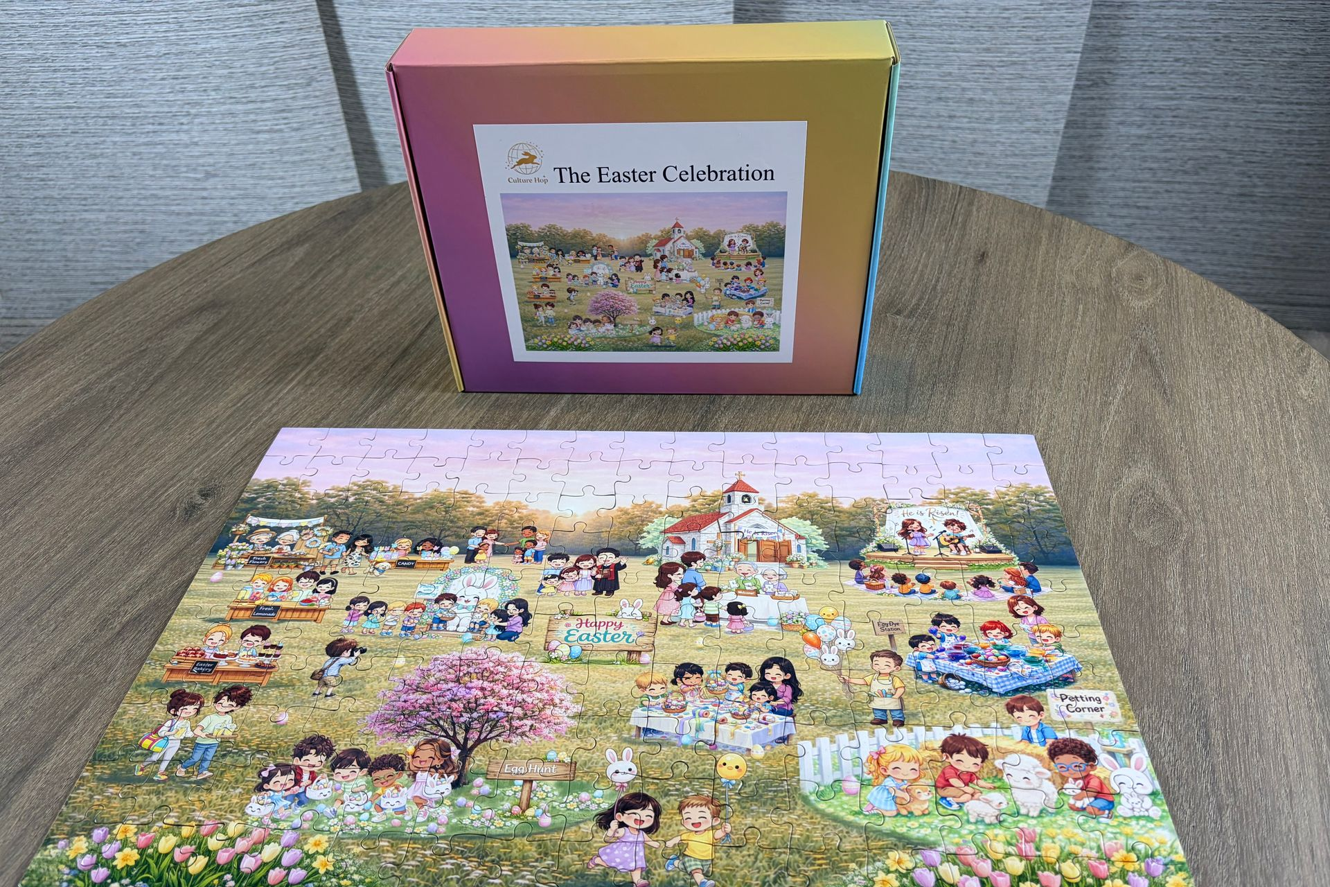 Easter Celebration 150-piece puzzle with box and completed artwork featuring children at an Easter festival egg hunt