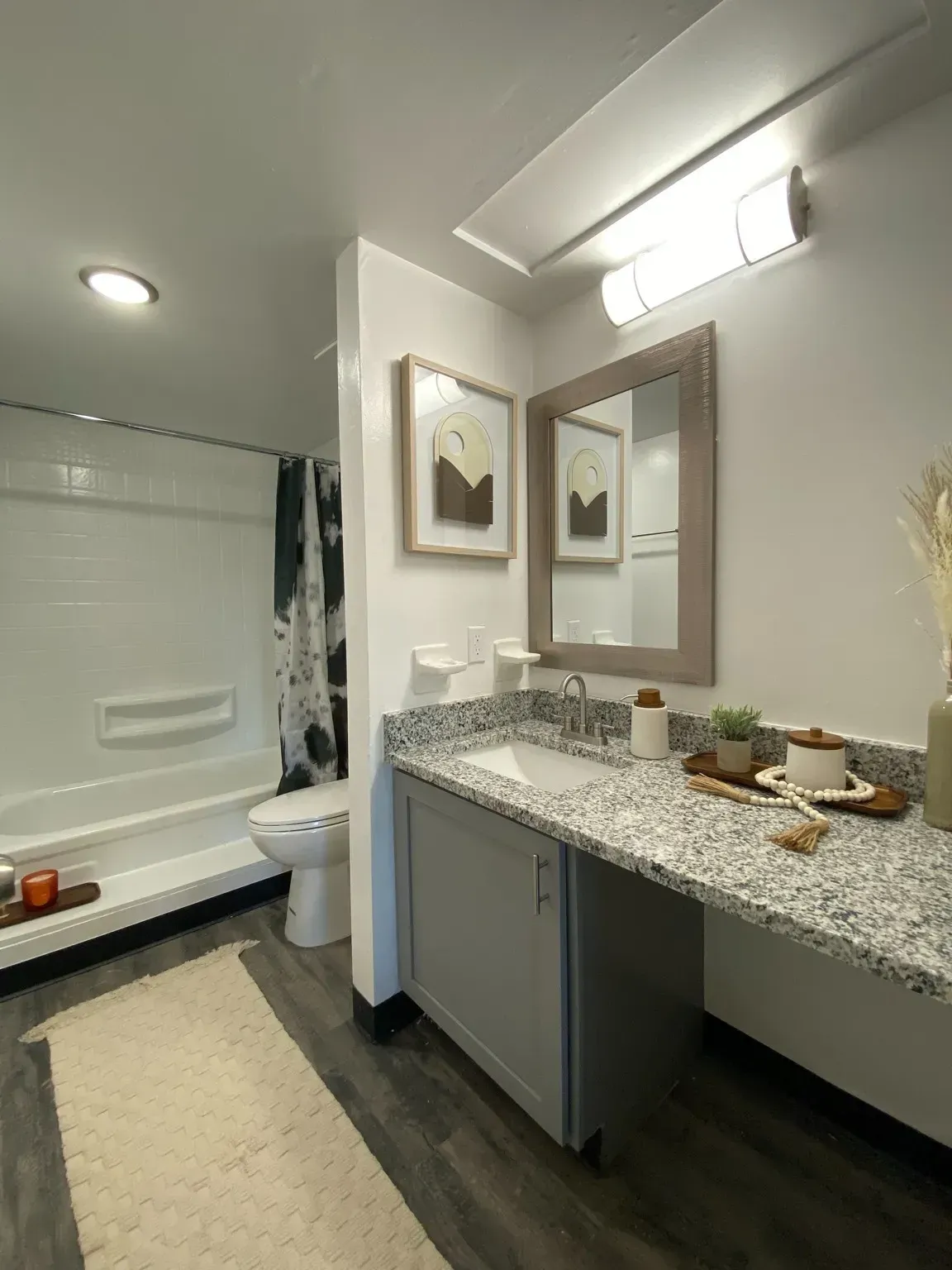 Modern bathroom with a sink, mirror, and shower