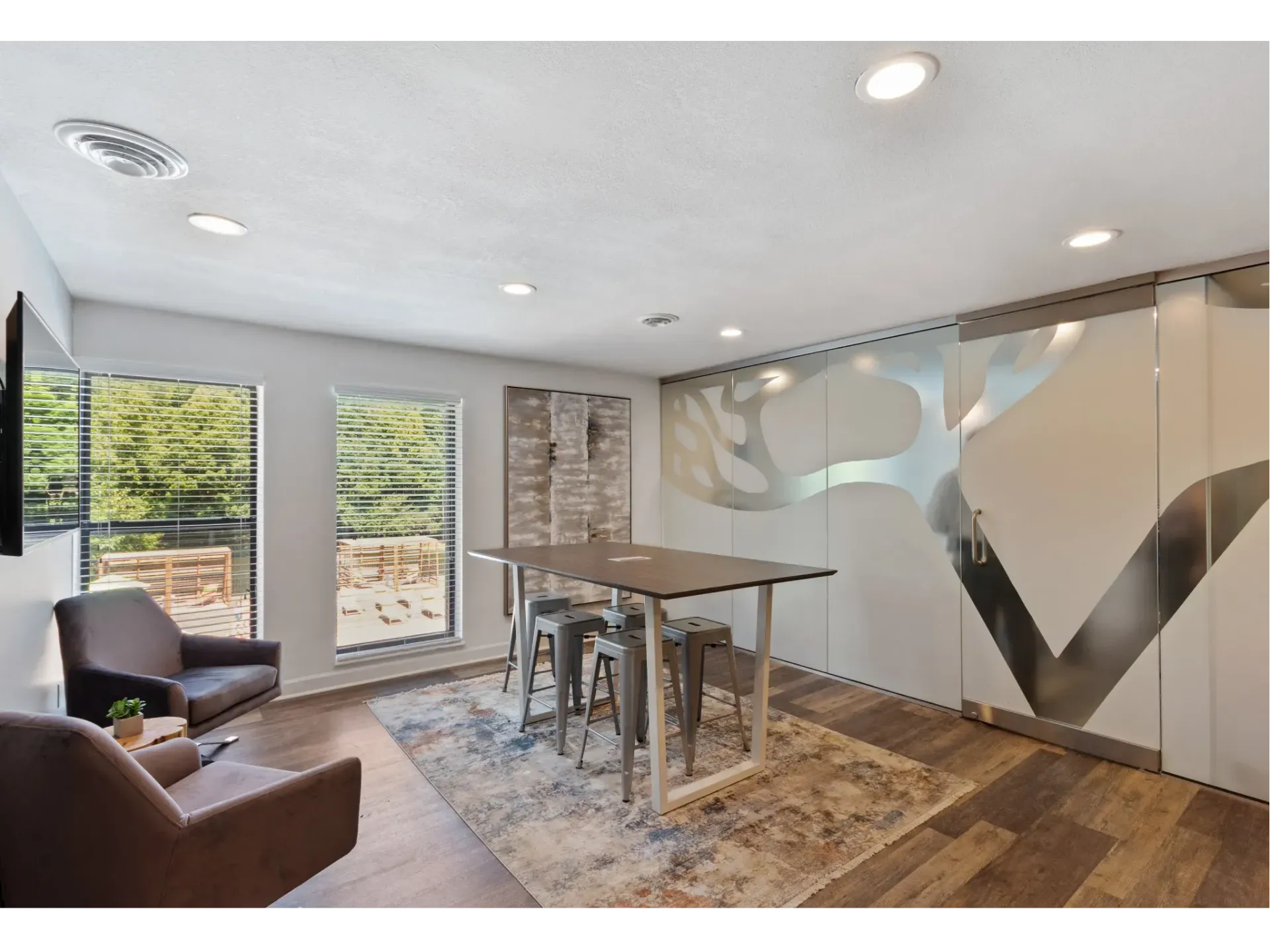 Modern community lounge with furniture and natural light