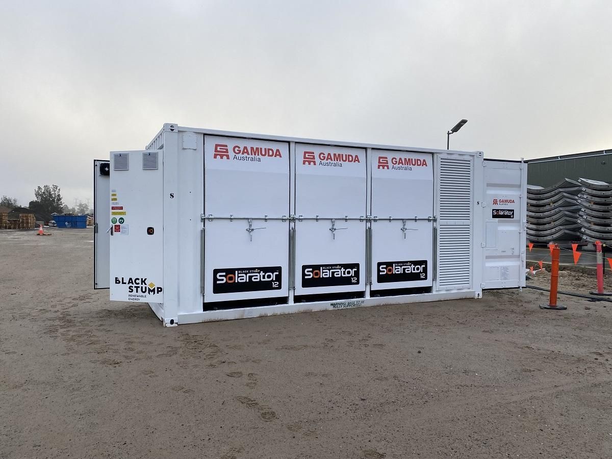 White container with doors open, labeled 