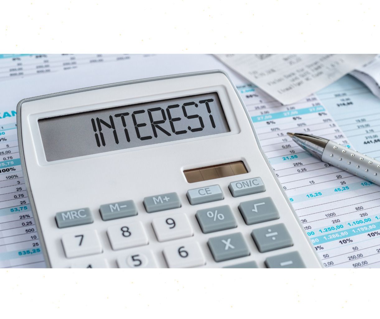 A calculator with the word interest written on it.