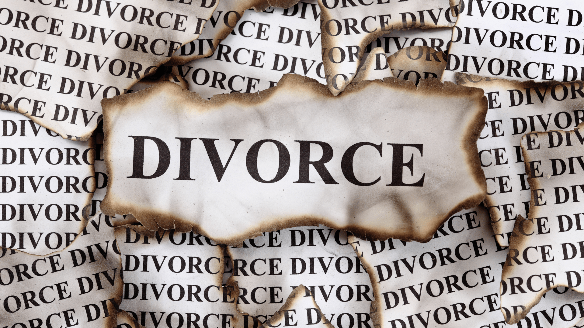 The word divorce is on a piece of paper