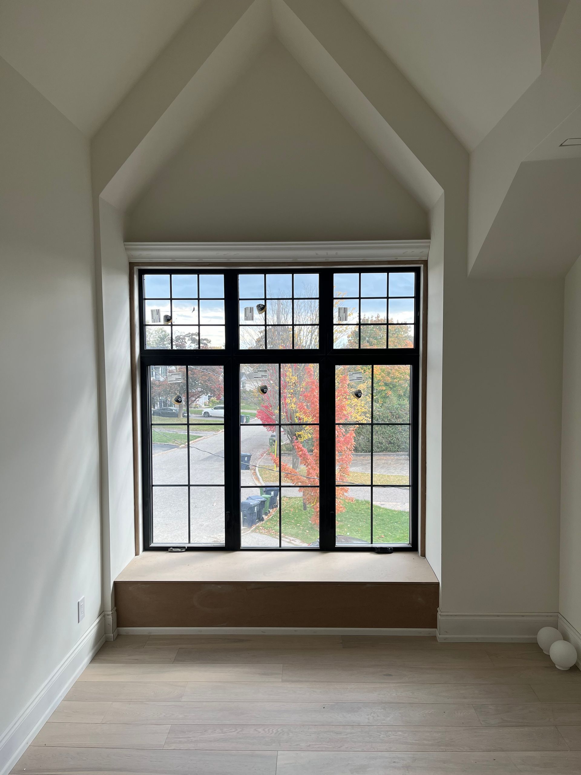 There is a large window in the middle of the room.