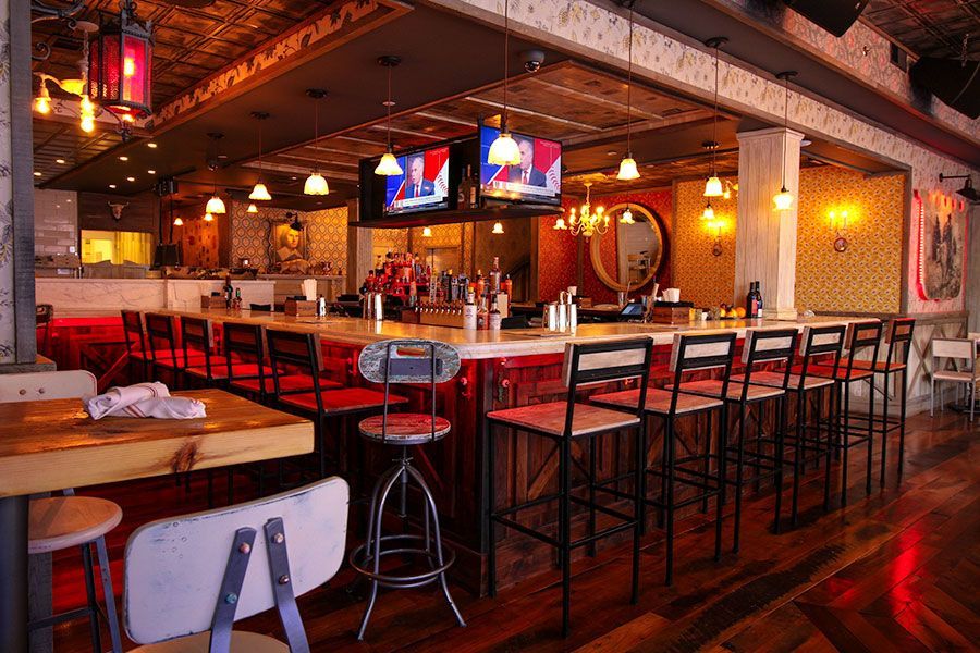 Bar and high-top seating at White Bull Tavern for company parties and gatherings