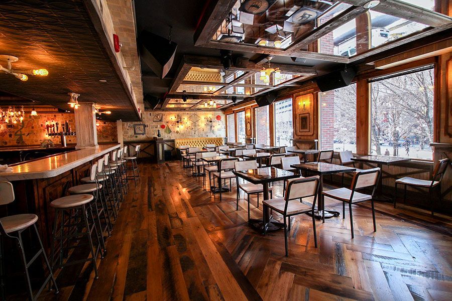 Open dining and bar area at White Bull Tavern near Faneuil Hall