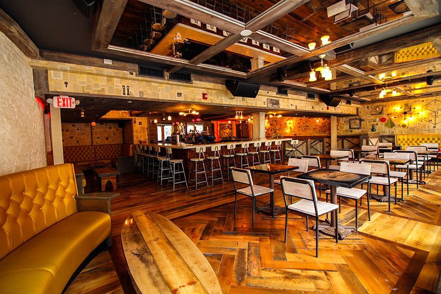 White Bull Tavern interior with tables and bar seating for group events