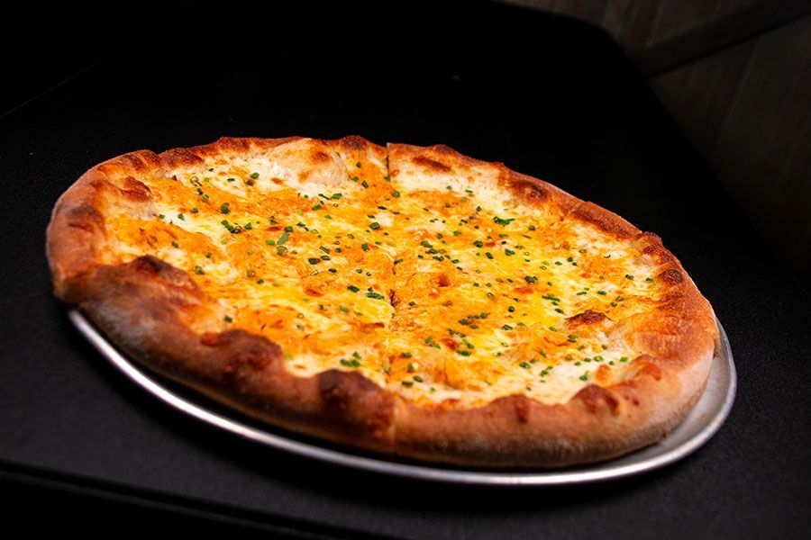 Buffalo chicken pizza with chives from The White Bull Tavern in Downtown Boston
